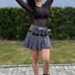 Shorts saia plissada