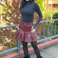 Saia shorts em courino com pregas