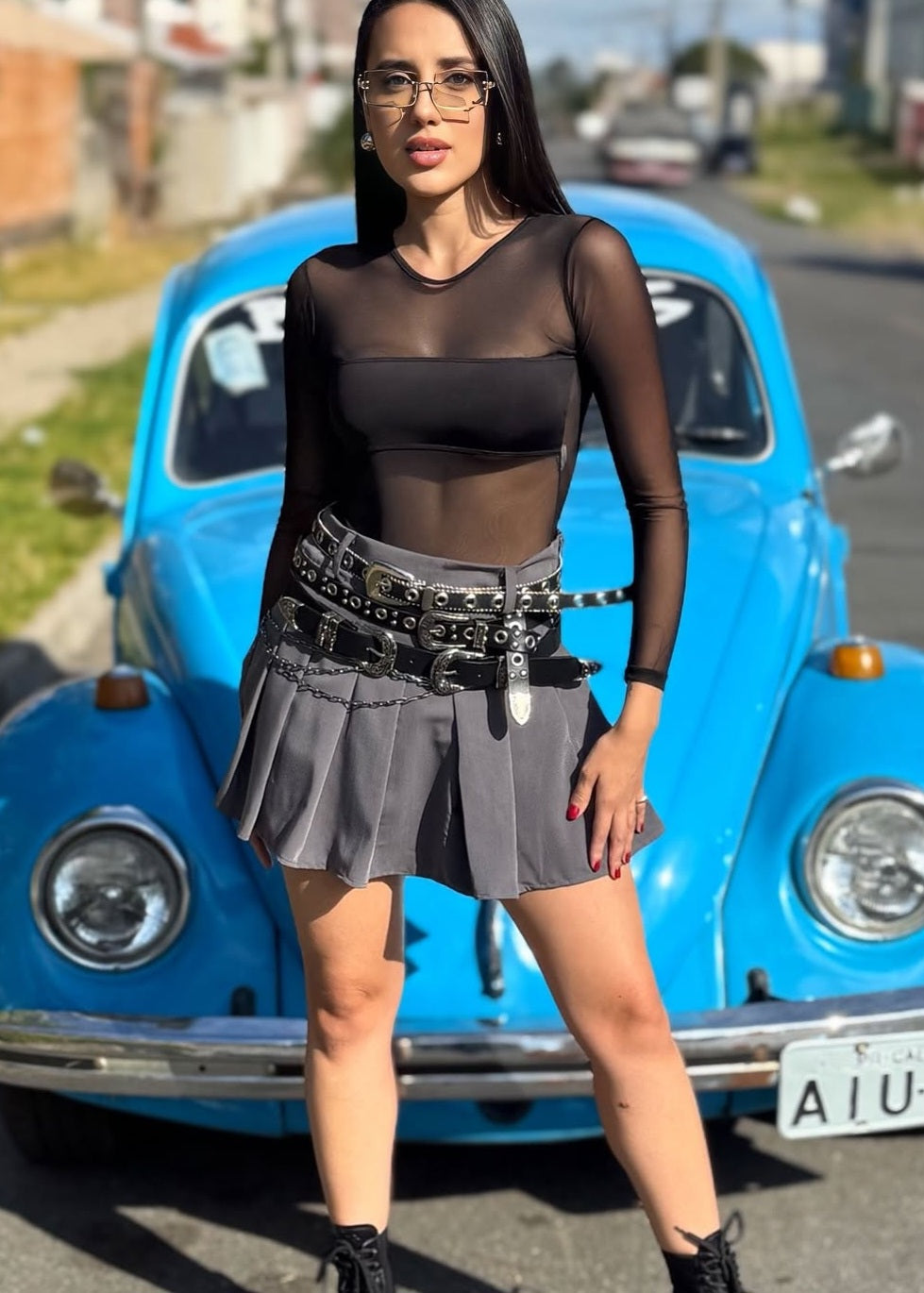 Shorts saia plissada